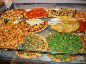 Many Pizzas Taken from: https://www.tripadvisor.com/LocationPhotoDirectLink-g187768-i24548274-Italy.html